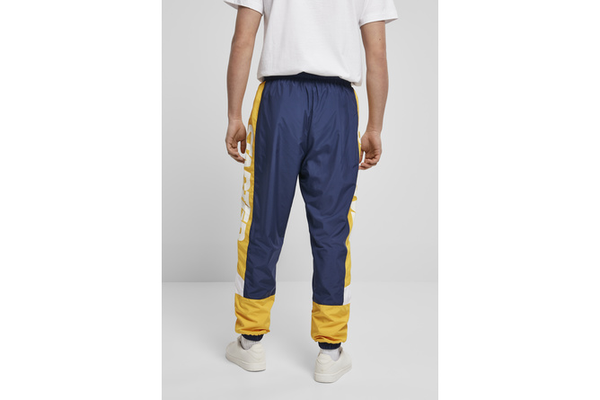 Pantalon survêtement rétro Starter bleu foncé/jaune